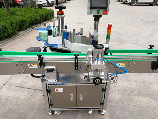 圓瓶貼標(biāo)機(jī)實拍圖